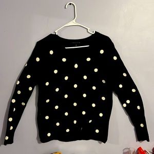 This is a long sleeve Tommy Hilfiger shirt. It’s navy blue with white polkadots